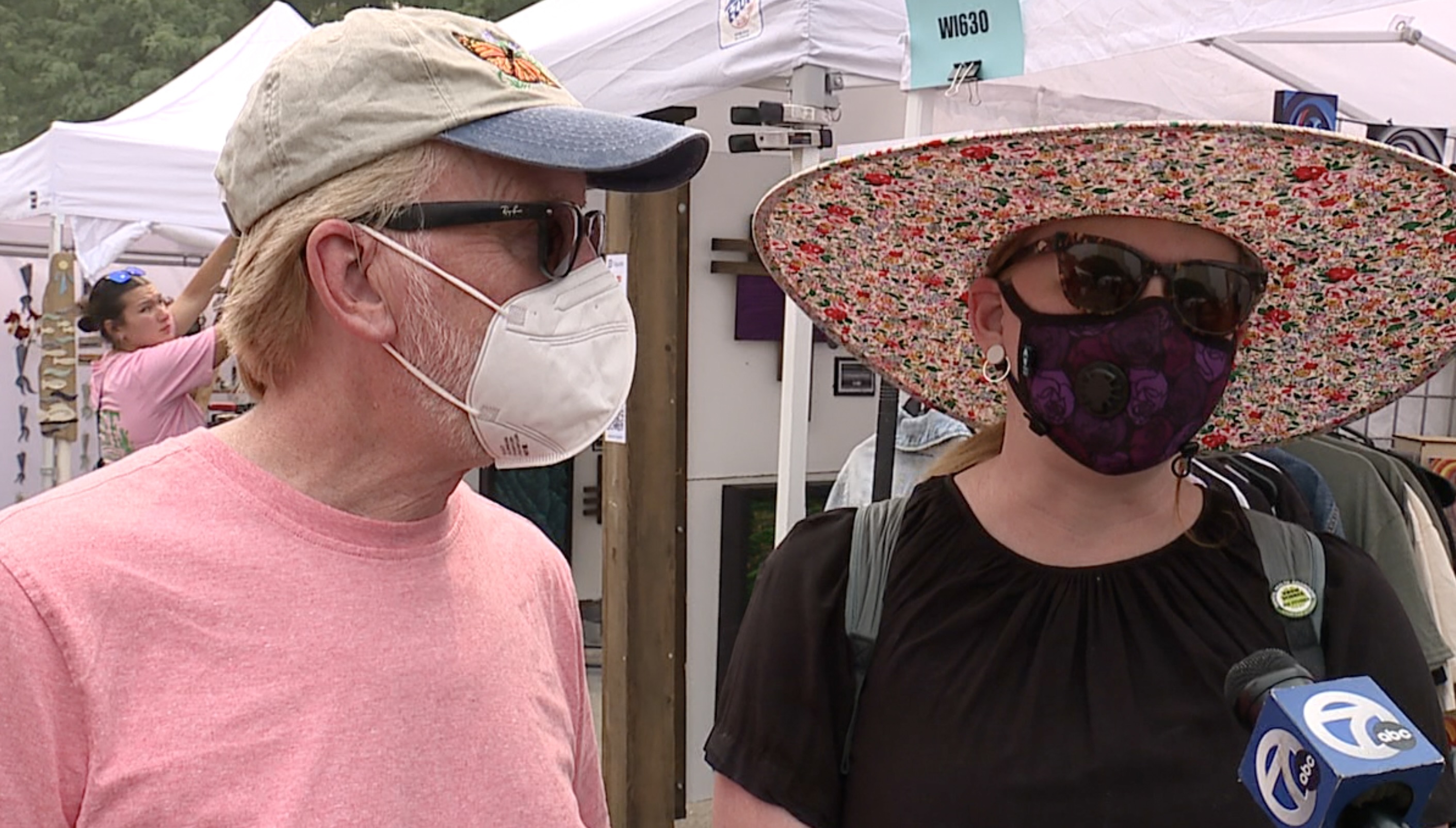 Smoky skies from Canadian and Minnesota wildfires don't stop crowds at Ann Arbor Art Fair